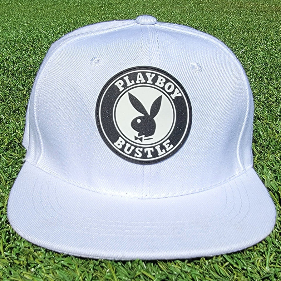 Classic cap in stiff all-over white cotton with black PVC crest - bustleclothing.shop