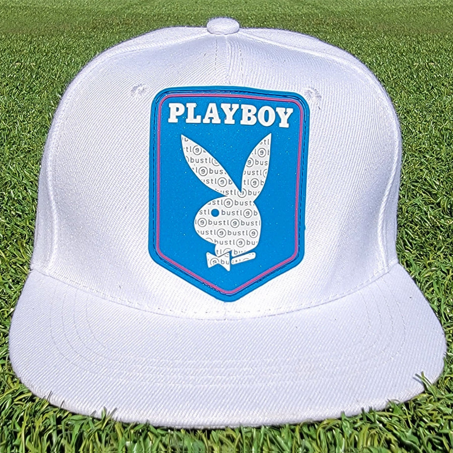 Classic cap in stiff all-over white cotton with blue PVC crest - bustleclothing.shop